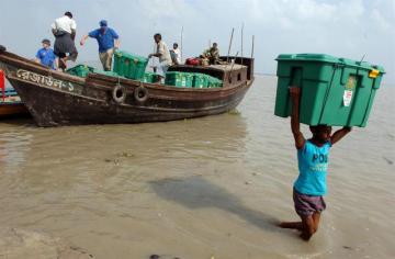 A Rotary Shelterbox comes ashore